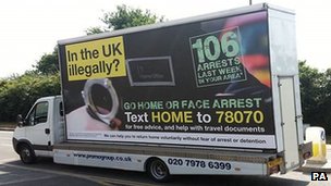 Home Office van bearing the slogan "In the UK illegally? Go home or face arrest"