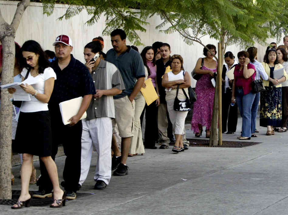 A line waits outside the U.S. Citizenship and Immigration Services office in Los Angeles.