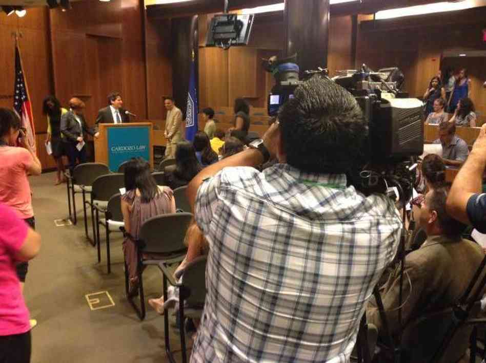 Matthew Diller, dean of Yeshiva University's Cardozo School of Law, talks with press about the New York Immigrant Family Unity Project in June.