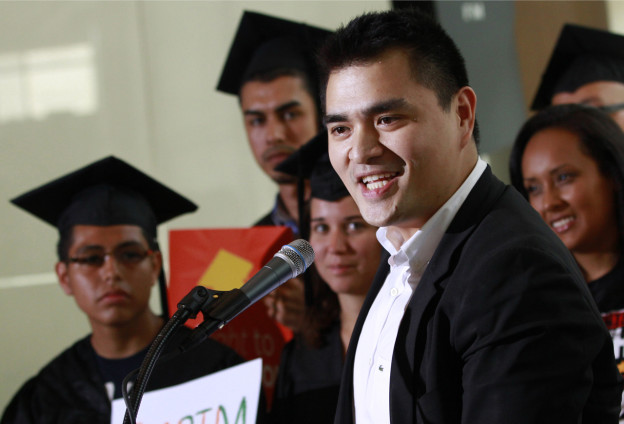 In this June 20, 2012, file photo former Washington Post journalist turned immigration reform activist, Jose Antonio Vargas, center, an illegal immigrant himself, speaks in Washington. (Jacquelyn Martin/AP)