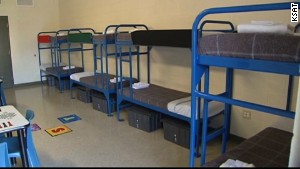 An eight-person room at the Karnes County detention center is shown on July 31, 2014.